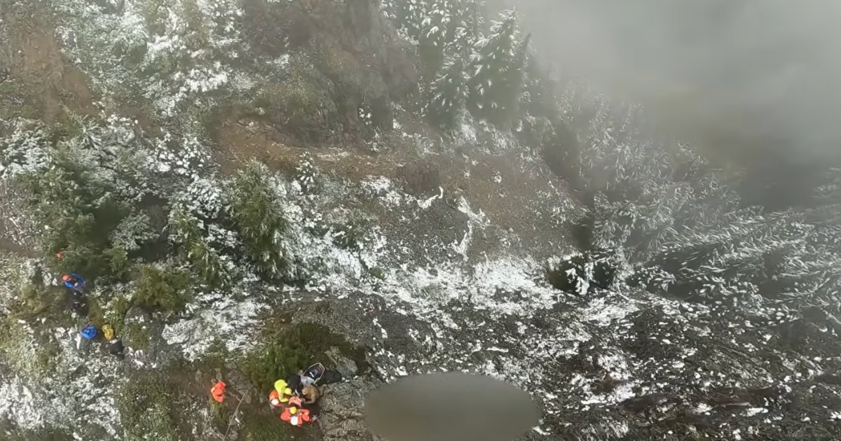Video shows rescuers treating mountain climber who fell 50 feet