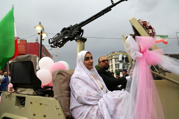 Decorated military vehicles used in Tehran wedding convoy 