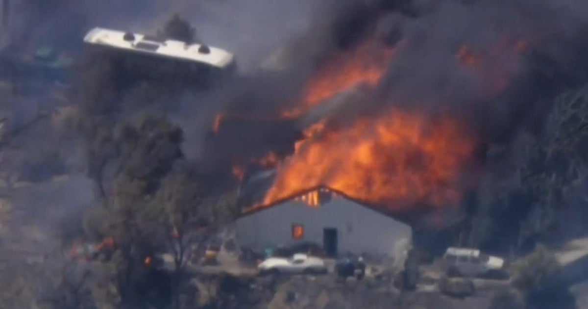 Eye Opener: Fast-moving wildfire in California threatens homes