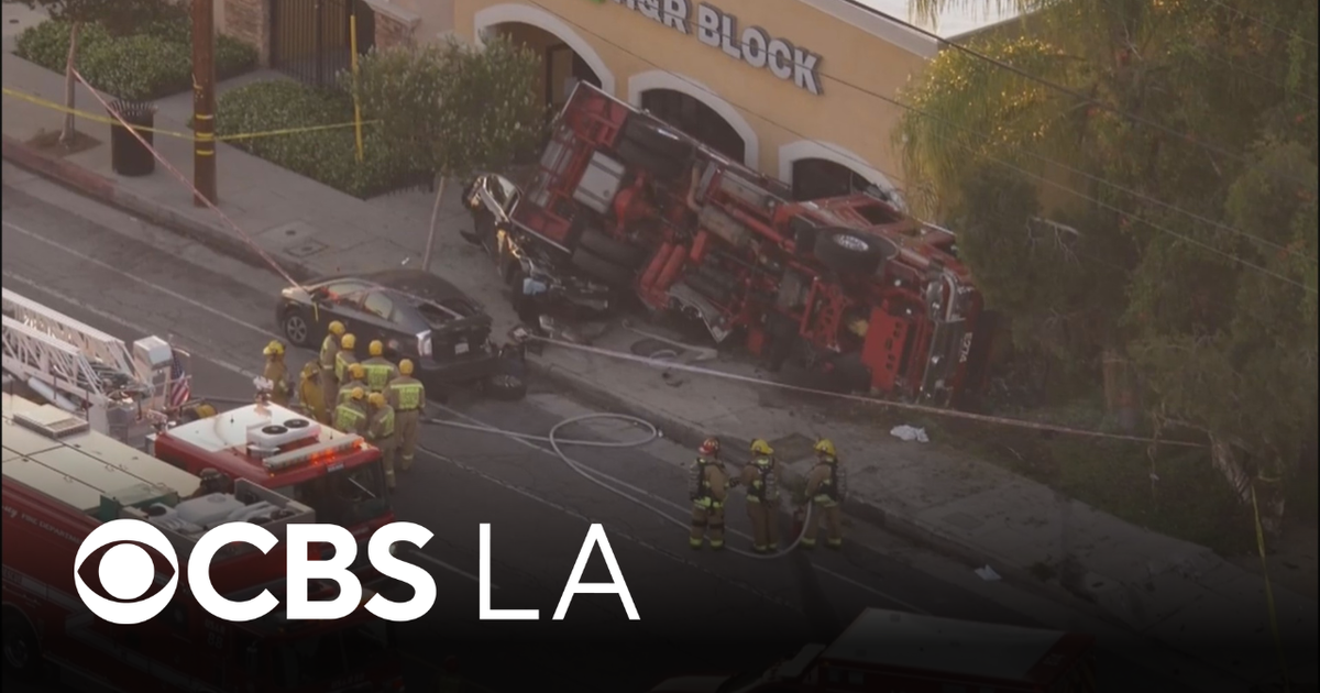 2 firefighters injured after fire engine crashes and rolls over in ...