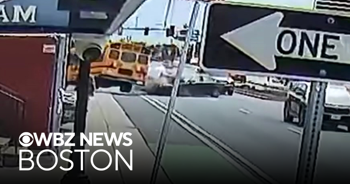 Video shows car crash into school bus in Everett - CBS Boston