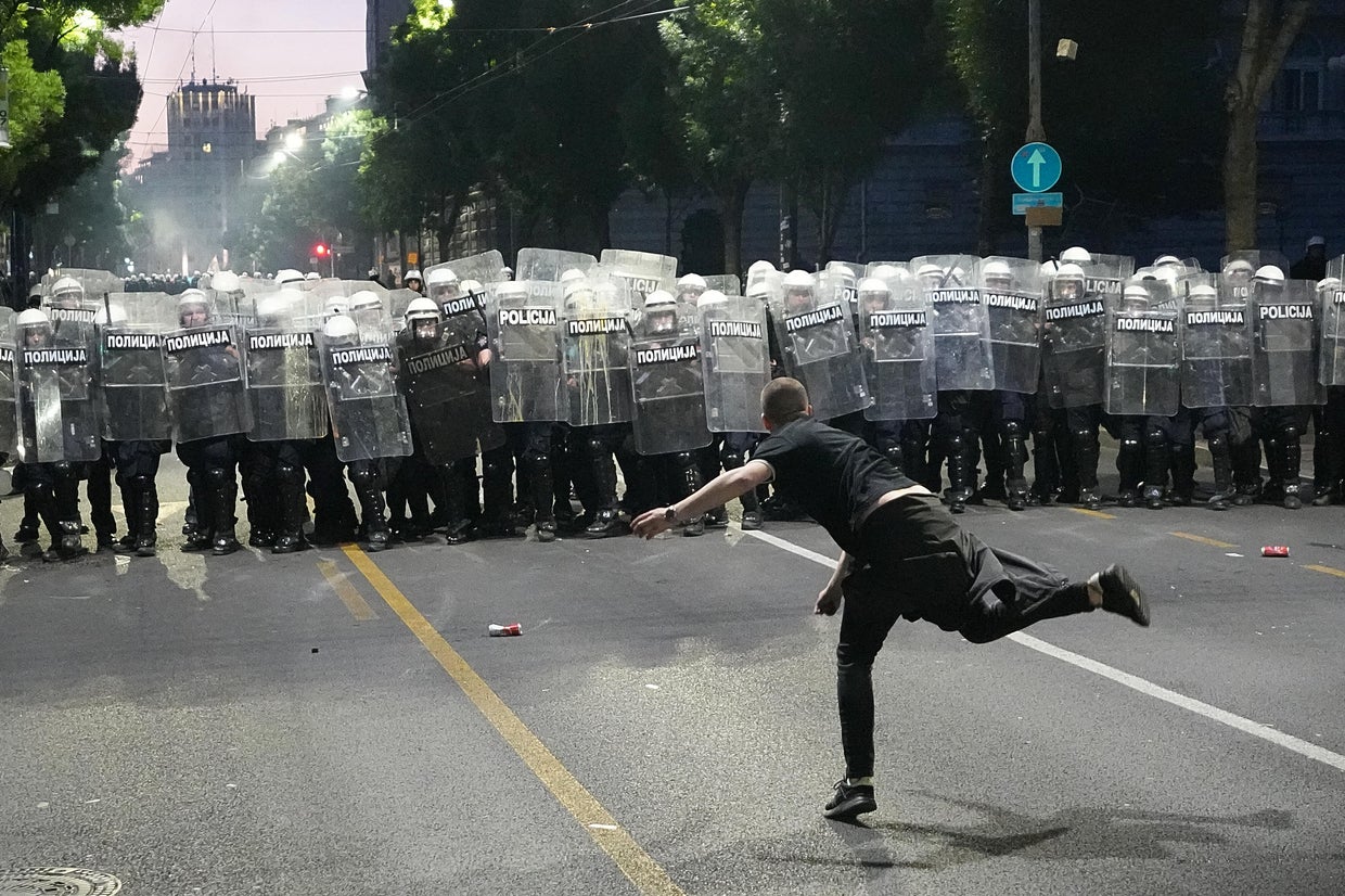 Serbian protesters clash with police amid massive anti-government rally ...
