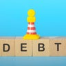 The image serves as a cautionary reminder of the challenges associated with debt and the importance of responsible financial management. 