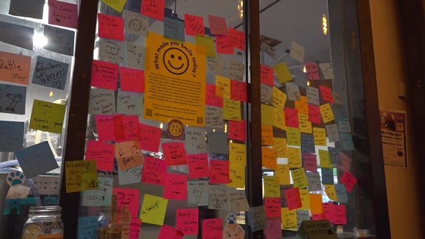 Post-it notes on a window
