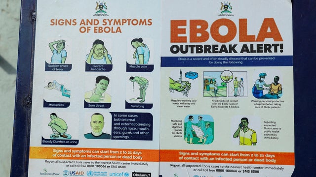 An advocacy poster against the spread of the Ebola virus is placed along the walkway at the Platinum Medical Centre in Kampala, Uganda, May 26, 2026. 