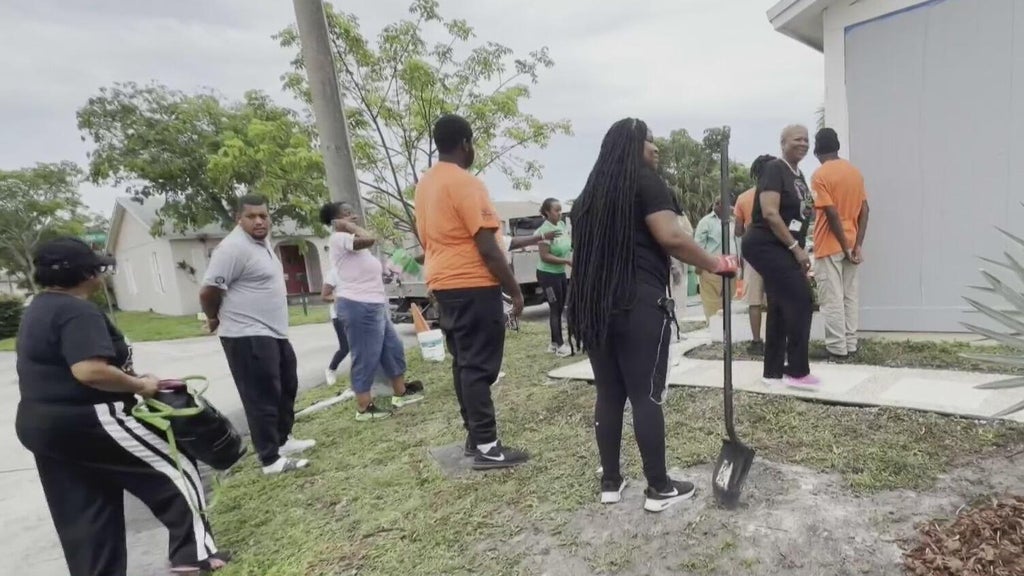 Members of Alpha Kappa Alpha sorority gather in Miami Gardens to help rehab home of 96-year-old vete