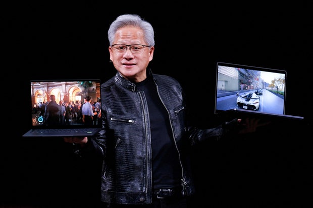 Nvidia CEO Jensen Huang introduces laptop models using RTX Spark GPUs during a keynote speech on the sidelines of the Computex trade show in Taipei