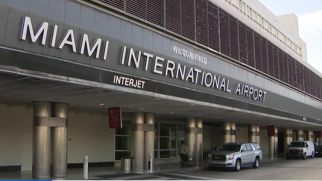 Flight to Chicago diverted to Miami after passenger tries to open exit door mid-flight