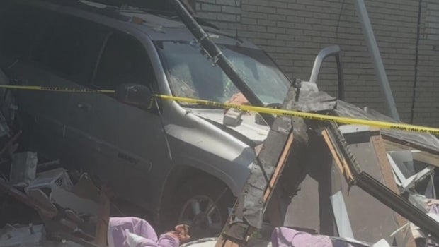 Detroit woman loses everything after car crashes into apartment