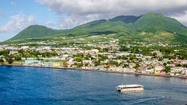 An aerial view looking over the ocean towards Basseterre Bay, Basseterre, Saint Kitts and Nevis. 
