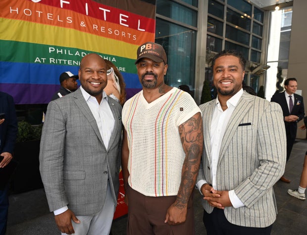 People post for photos at a Pride event at Sofitel Hotel in Philadelphia 