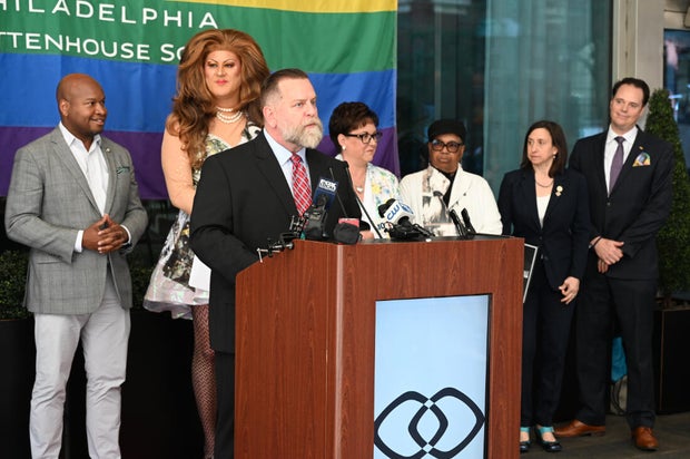 People post for photos at a Pride event at Sofitel Hotel in Philadelphia 