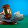 Close-up of gavel on table 