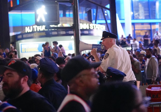 Knicks fans in New York City celebrate after their team's NBA Finals Game 2 win 