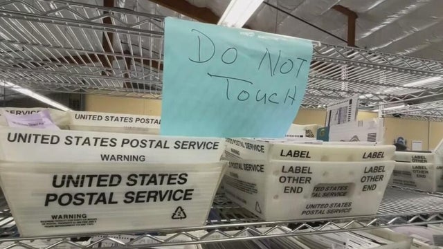 election ballots in united states postal service containers 