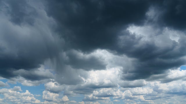 dark dramatic sky with stormy clouds before rain as abstract background, extreme weather 