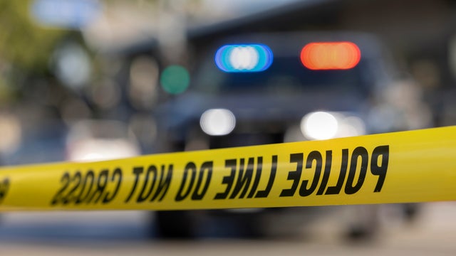 Police car and crime scene tape 