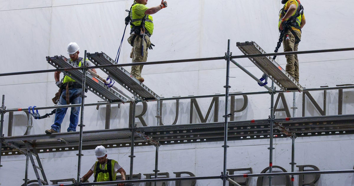 Workers begin removing Trump's name from Kennedy Center