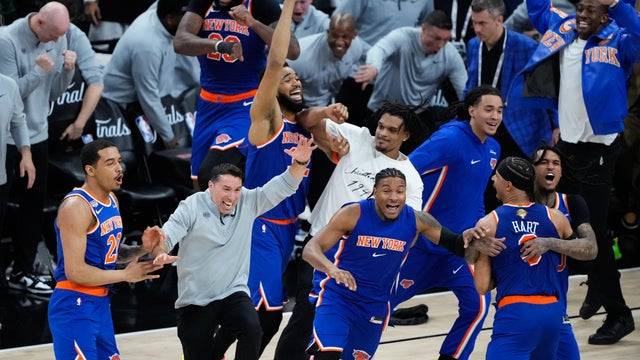 The New York Knicks celebrate after defeating the San Antonio Spurs in Game 5 of the NBA Finals basketball series, Saturday, June 13, 2026, in San Antonio. 