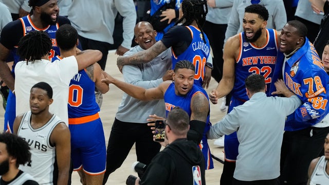 The New York Knicks celebrate after defeating the San Antonio Spurs in Game 5 of the NBA Finals basketball series, Saturday, June 13, 2026, in San Antonio. 