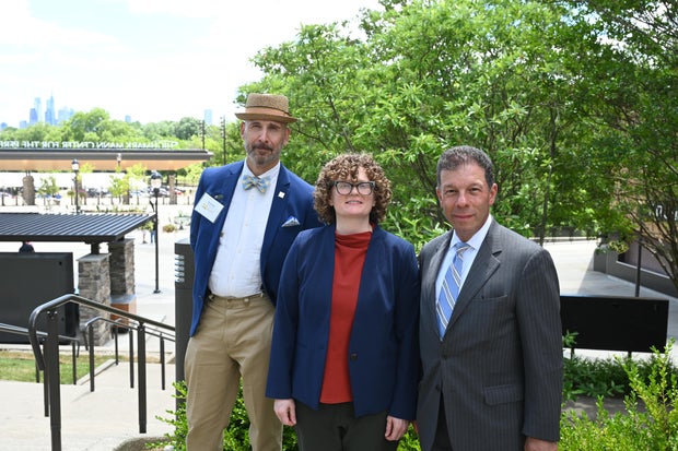 People celebrate the opening of the new Mann Center campus