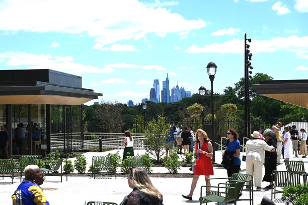 People celebrate the opening of the new Mann Center campus