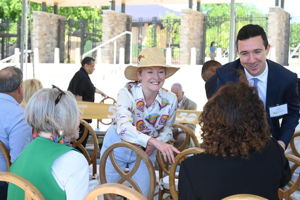 People celebrate the opening of the new Mann Center campus