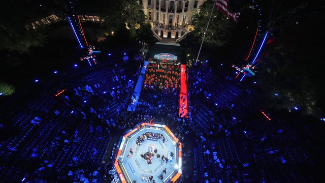President Trump and guests in the Octagon during the UFC Freedom250 fight on the South Lawn of the White House in Washington, D.C. 