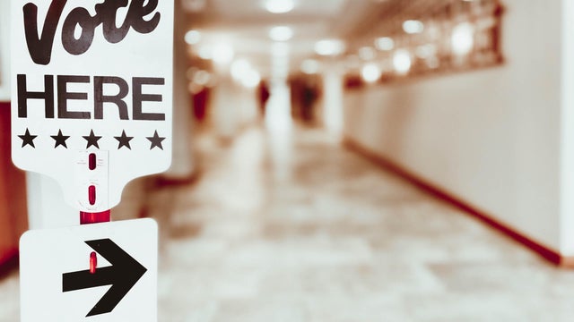 "Vote Here" Directional Sign at Polling Place 