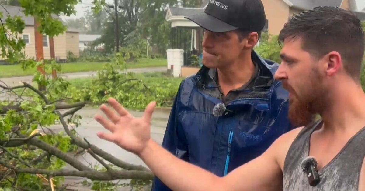 Destructive tornado "sounded like thunder" as it hurled tree into Illinois home, witness says