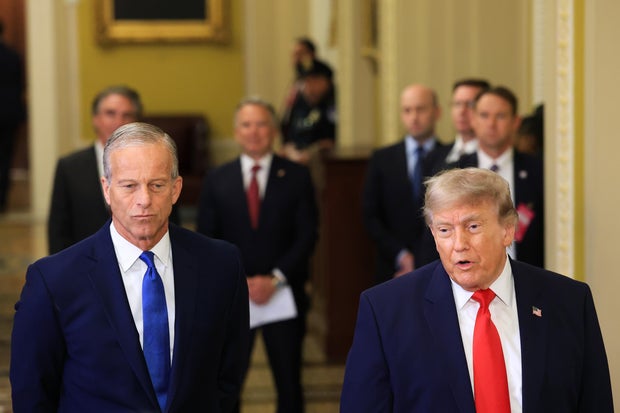 Senate Majority Leader John Thune watches as President Trump speaks to the media at the U.S. Capitol on June 24, 2026.