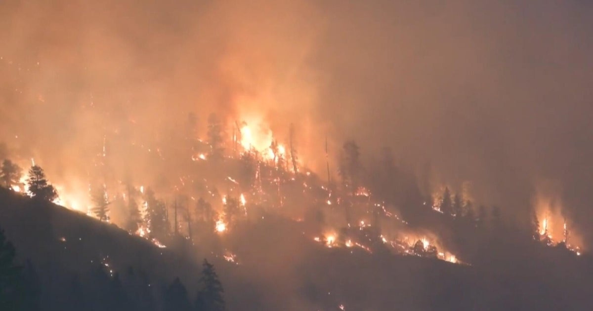 Wildfires in Colorado rapidly spread, destroying buildings and forcing evacuations