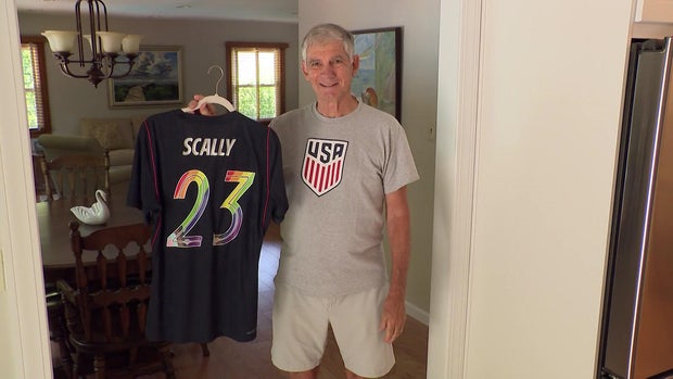 Frank Schmidt holds up a Joe Scally match jersey