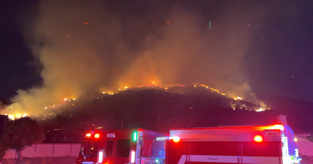San Bernardino County firefighters battle Beech Fire in Fontana