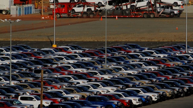 FILE PHOTO: Newly assembled vehicles are seen at a stockyard of the automobile plant Toyota Motor Manufacturing of Baja California in Tijuana, Mexico 