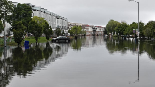 Heavy rain brings store roof collapse and flooding to New Jersey