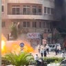 Explosive devices blow up near a hotel where French President Emmanuel Macron was meant to be staying, in Damascus 
