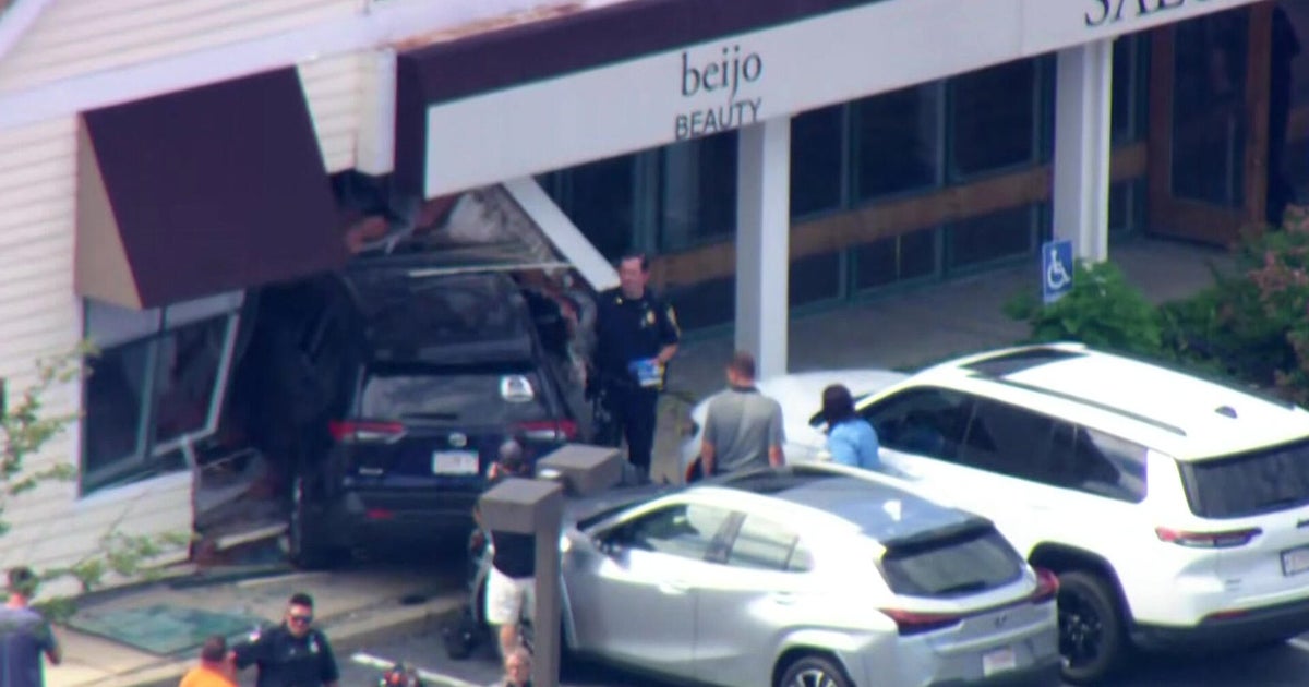 SUV crashes into Danvers, Massachusetts hair salon, customer thrown from chair