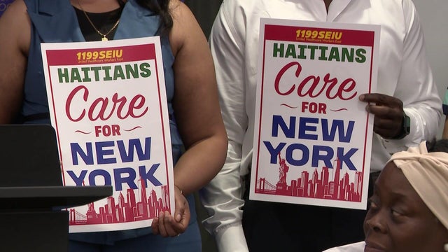 "Haitians care for New York" signs 