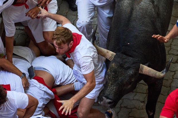 Bull gores runner in the face at Spain's San Fermin bull run festival