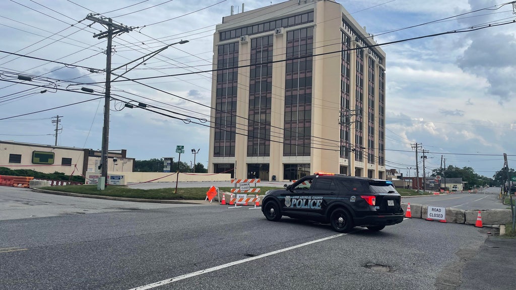 Glen Burnie Apartment Garage Impasse: Unpermitted Work Traps Dozens of Cars