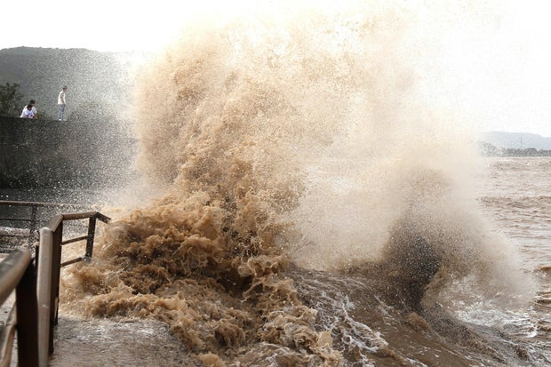 Typhoon Bavi weakens but still lashes China with strong winds, rain