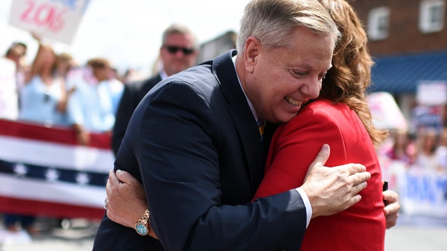 Darline Graham Nordone, sister of Sen. Lindsey Graham, walks to the stage before his announcement for presidency on Monday, June 1, 2015, in Central, South Carolina. 