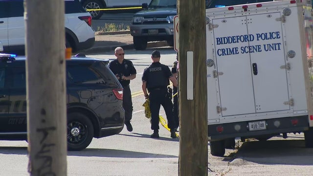 Crews work the scene after a shooting in Biddeford, Maine, July 13, 2026. 