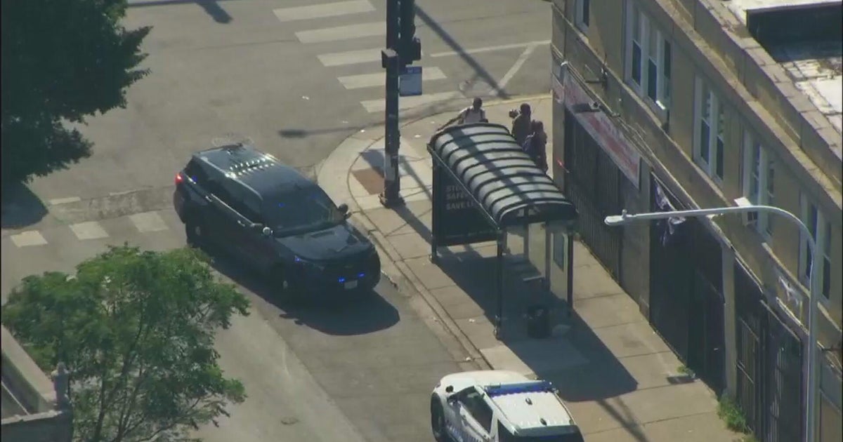 Woman shot in leg inside South Shore business, CPD says