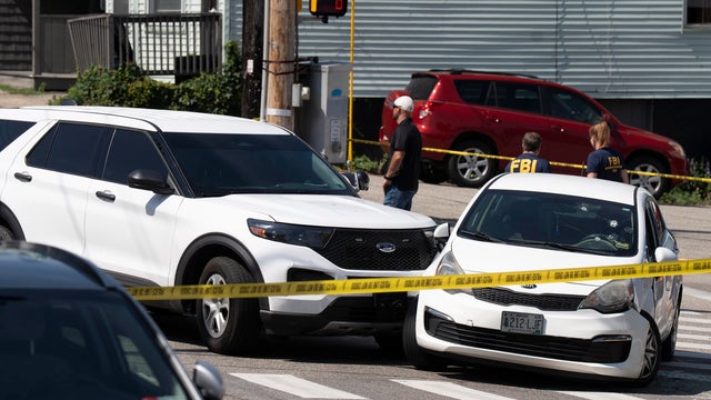 A Kia sedan driven by a man who was shot and killed by an ICE agent can be seen with four bullet holes in the windshield in Biddeford, Maine, July 13, 2026. 