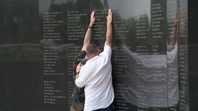 Two family members at the TWA Flight 800 International Memorial 