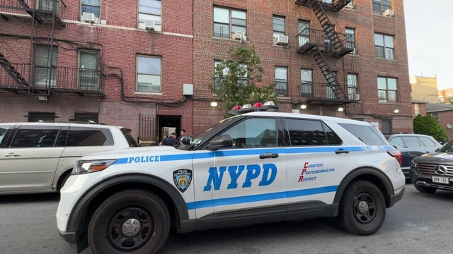 NYPD vehicle outside Bronx apartment building 