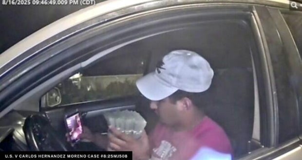 nebraska-tda-jackpotting-4-holding-cash-doj.jpg