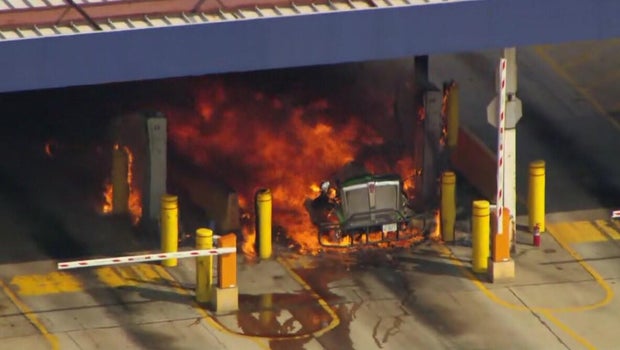 Semi-trailer truck catches fire at freight yard in Elwood, Illinois